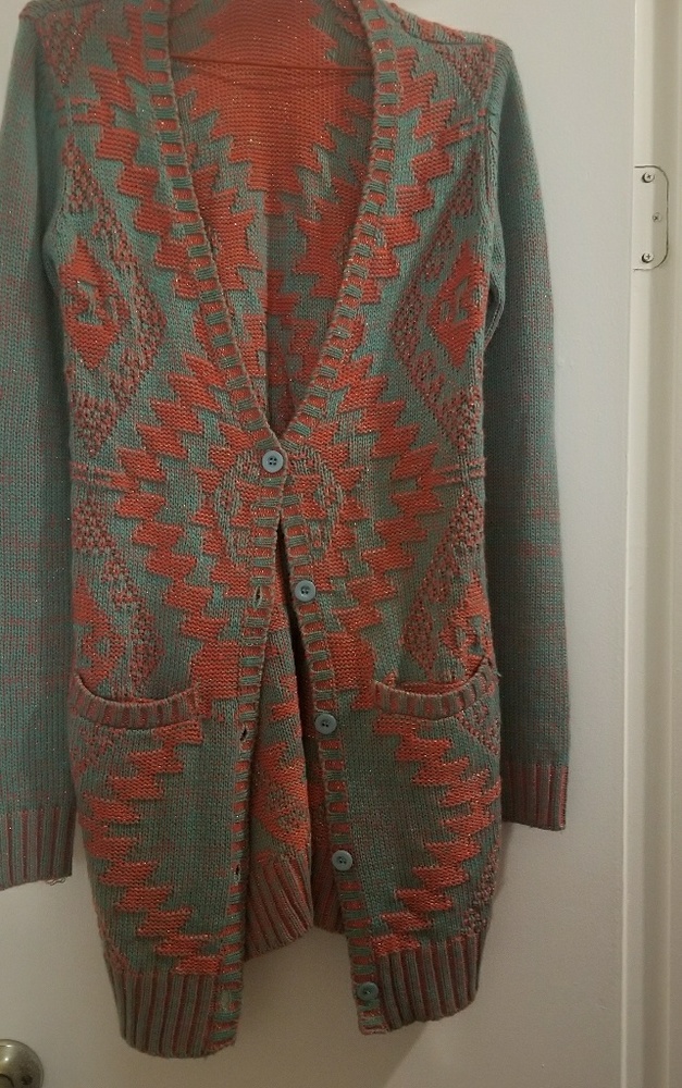 Unique coral and turquoise sparkle cardigan.